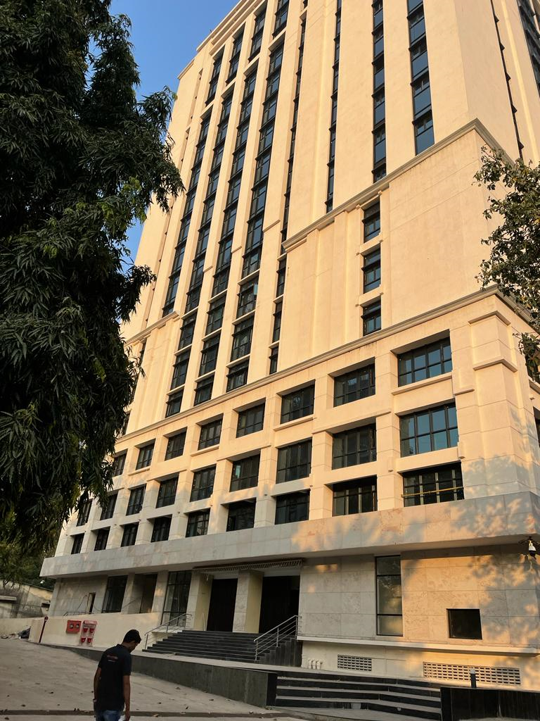 Project – Structural Glazing, Mazgaon Court, Mumbai - Yellow Building